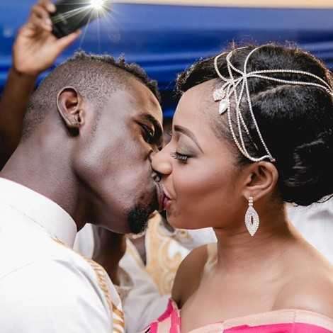 Afriyie-Acquah-kisses-wife