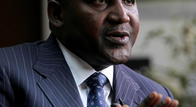Founder and Chief Executive of the Dangote Group Aliko Dangote gestures during an interview with Reuters in his office in Lagos, Nigeria, June 13, 2012. To match Insight NIGERIA-FOREX/DANGOTE     REUTERS/Akintunde Akinleye/File Photo   - RTX2HPTG