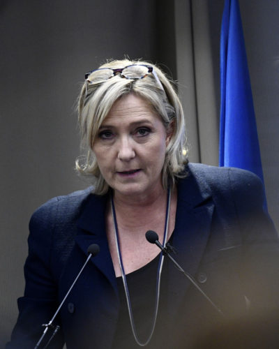 French far-right Front National (FN) party president, member of European Parliament and candidate for France's 2017 presidential election, Marine Le Pen delivers a speech during a meeting about healthcare, on December 9, 2016 in Paris.  / AFP PHOTO / MARTIN BUREAU