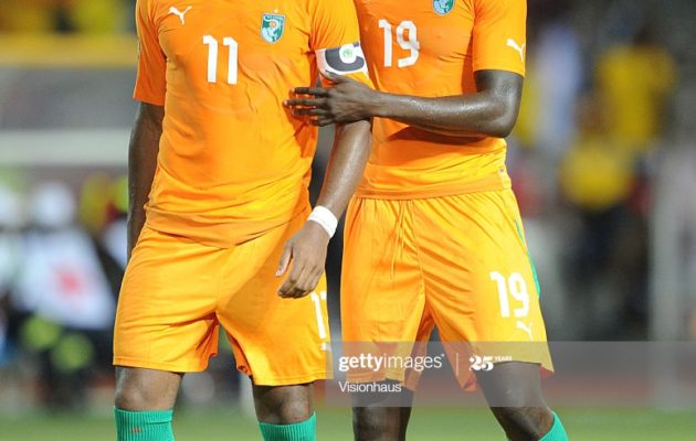 A dejected Didier Drogba of Ivory Coast is comforted by Yaya Toure after missing his penalty during the 2012 African Cup of Nations Final between Zambia and Ivory Coast at the Stade de l'Amitie in Libreville, Gabon. Photo: Ben Radford/Visionhaus (Photo by Ben Radford/Corbis via Getty Images)