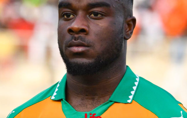 Ivory Coast's national football team player Maxwel Cornet stands at the 'Stade de la Paix' in Bouake on June 10, 2017 during the 2019 African Cup of Nations qualifier football match between Ivory Coast and Guinea.  / AFP PHOTO / ISSOUF SANOGO        (Photo credit should read ISSOUF SANOGO/AFP via Getty Images)